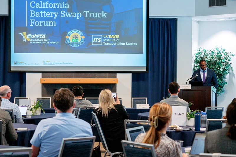 Image of Secretary Toks giving a presentation during the Battery Swap Electric Truck Forum.